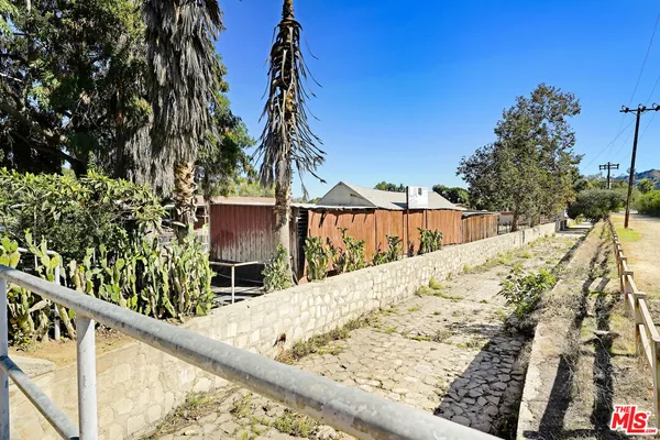 a view of a balcony with door