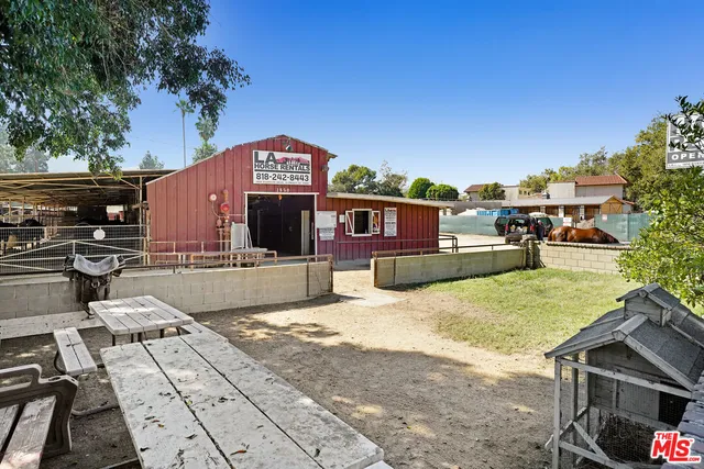 a view of street with parked cars