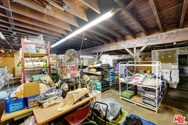 a view of a chairs and table in a room