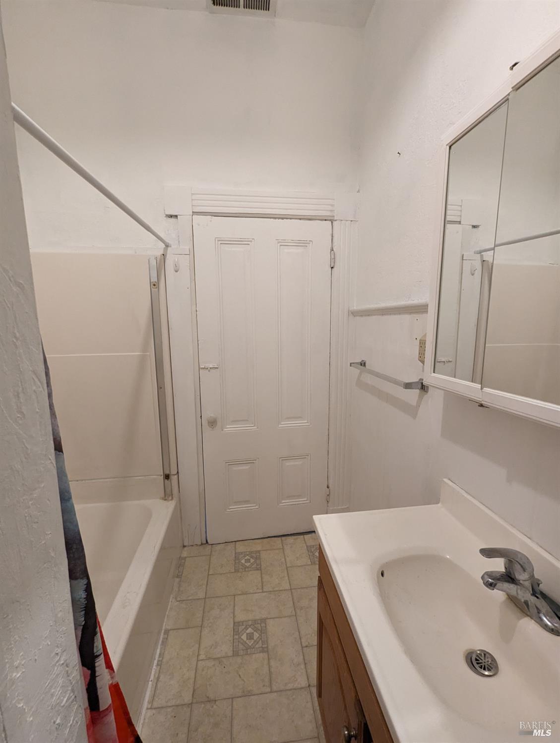 1547 4th Street, Unit A San Rafael, CA 94901 - Photo 63 of 64 a bathroom with a sink a toilet and shower