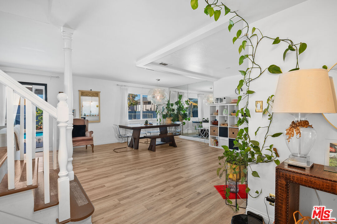 1397 Sycamore Drive Simi Valley, CA 93065 - Photo 3 of 20 a living room with furniture and wooden floor
