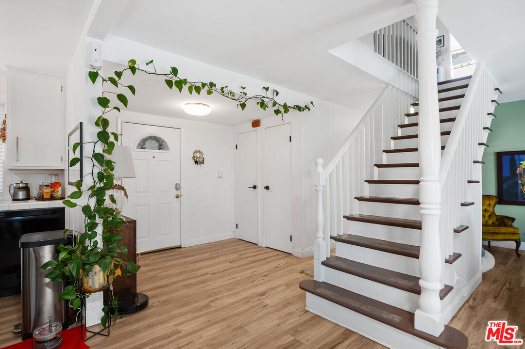 1397 Sycamore Drive Simi Valley, CA 93065 - Photo 7 of 20 a view of entryway with stairs