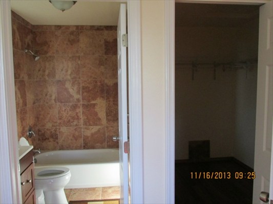 18-7892 Kini Road Mountain View, HI 96771 - Photo 14 of 22 a bathroom with a shower and a toilet