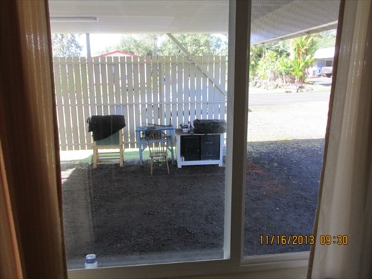18-7892 Kini Road Mountain View, HI 96771 - Photo 18 of 22 a view of two chairs in the balcony