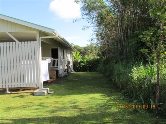 18-7892 Kini Road Mountain View, HI 96771 - Photo 6 of 22 a view of a porch with a small yard