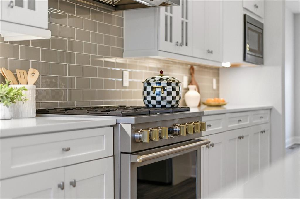 3061 Preston Way Bridgeville, PA 15017 - Photo 22 of 45 a stove top oven sitting inside of a kitchen