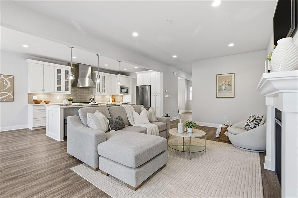 3061 Preston Way Bridgeville, PA 15017 - Photo 26 of 45 a living room with furniture and a wooden floor