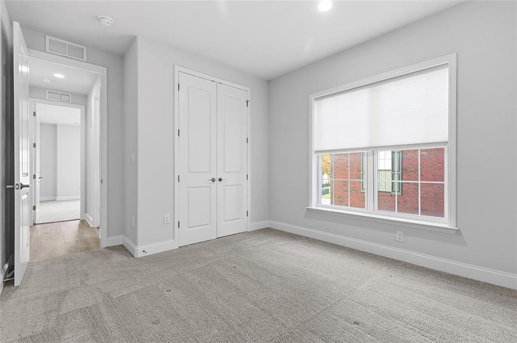 3061 Preston Way Bridgeville, PA 15017 - Photo 32 of 45 an empty room with a empty space and windows