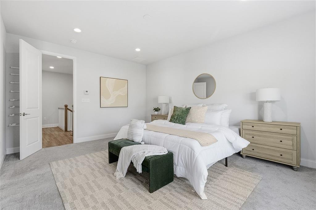 3061 Preston Way Bridgeville, PA 15017 - Photo 39 of 45 a bedroom with a bed and lamp