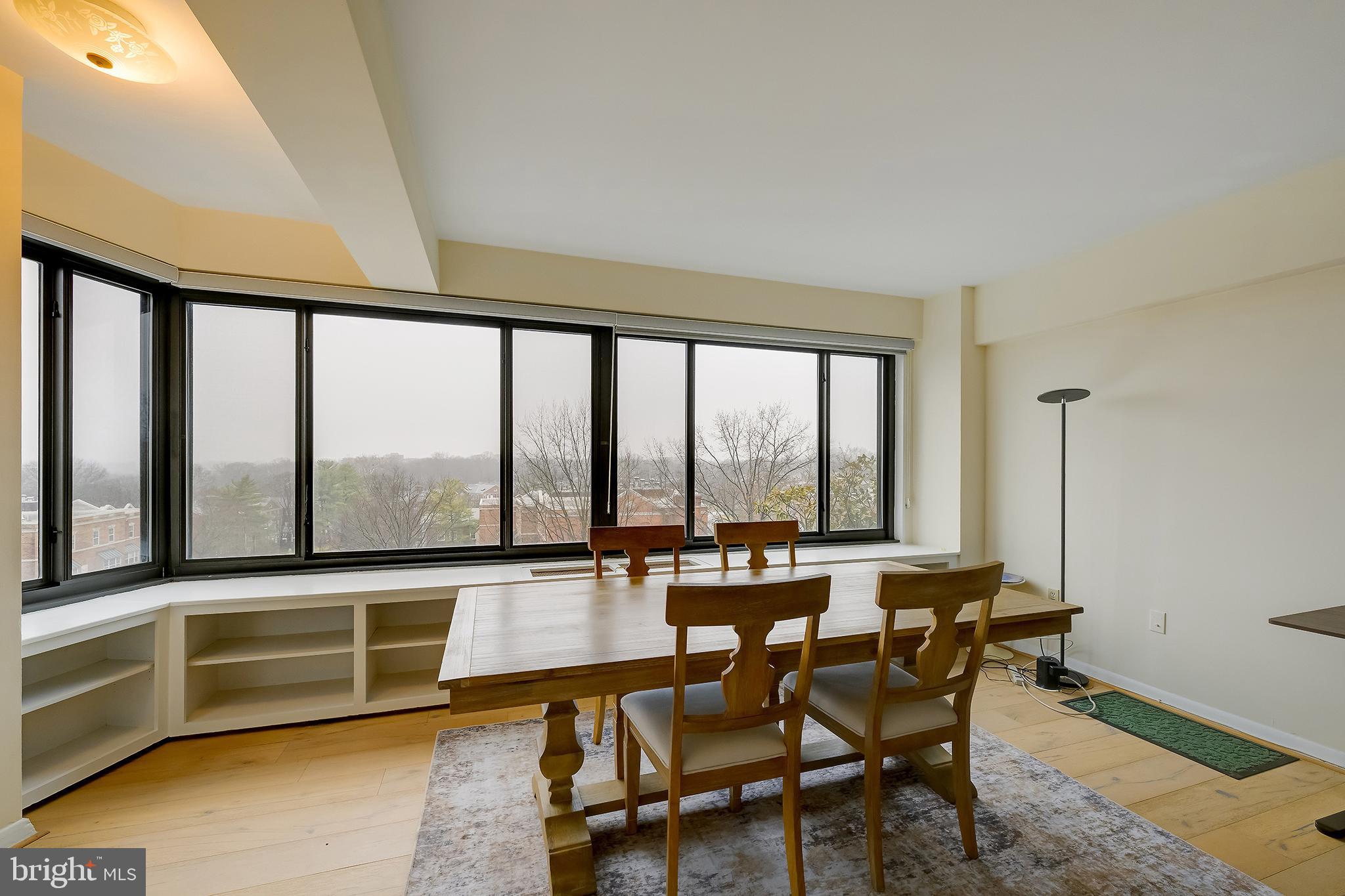 3601 Wisconsin Avenue Northwest, Unit 504 Washington, DC 20016 - Photo 11 of 23 a view of a dining room with furniture window and outside view