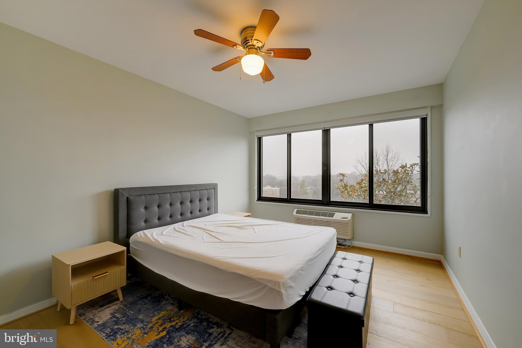 3601 Wisconsin Avenue Northwest, Unit 504 Washington, DC 20016 - Photo 19 of 23 a bedroom with a bed a window and closet