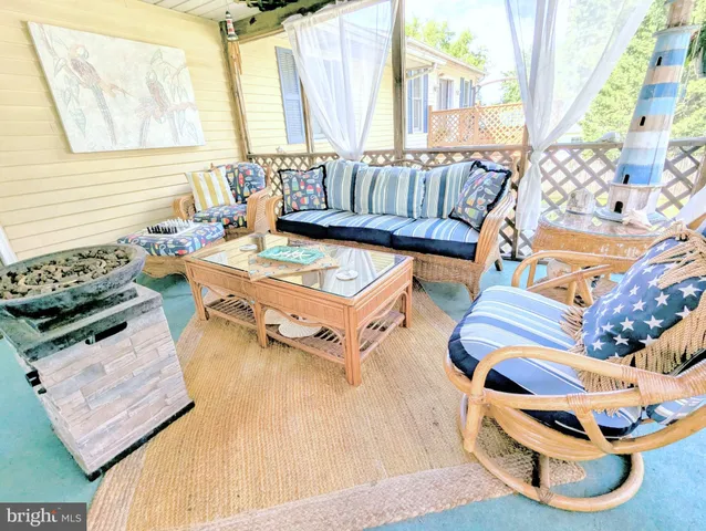 a bed room with a bed television and a fireplace
