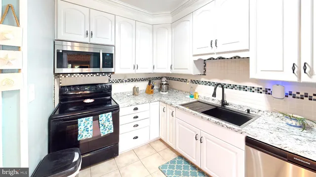 a view of a chairs and table in patio
