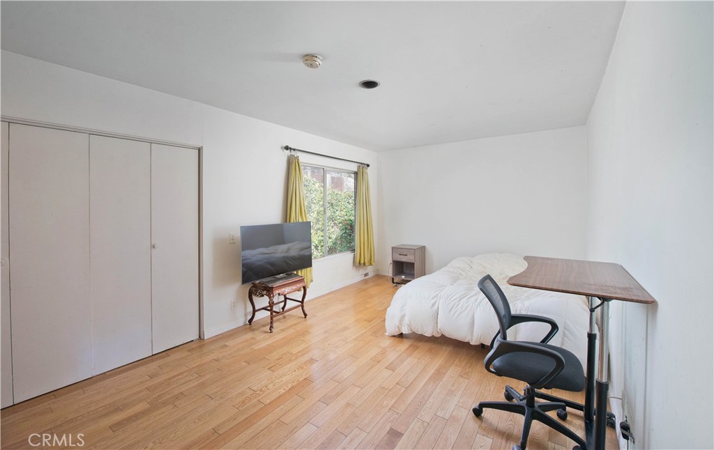 507 West Rustic Road Santa Monica, CA 90402 - Photo 15 of 19 a bedroom with furniture and a window