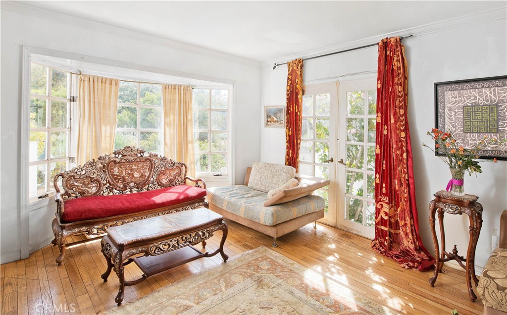 507 West Rustic Road Santa Monica, CA 90402 - Photo 7 of 19 a living room with furniture and a large window