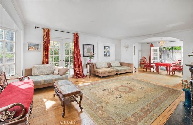 a kitchen with stainless steel appliances a refrigerator and a stove top oven