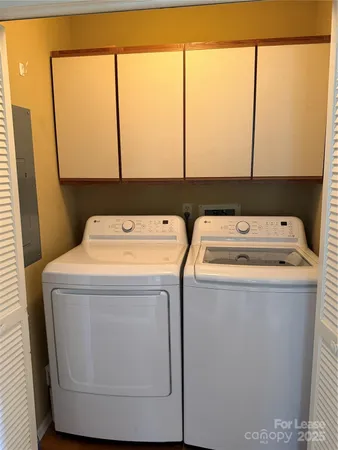 a utility room with dryer and washer