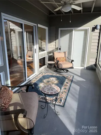 a living room with furniture and rug