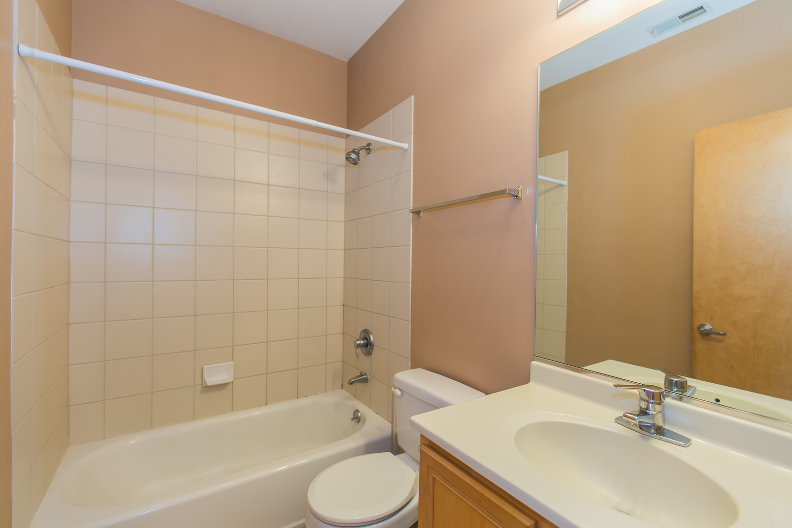 1808 South Michigan Avenue, Unit 38 Chicago, IL 60616 - Photo 12 of 18 a bathroom with a sink toilet and shower