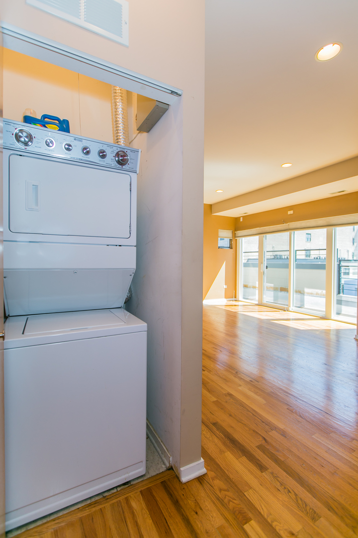 1808 South Michigan Avenue, Unit 38 Chicago, IL 60616 - Photo 15 of 18 a view of walk in closet with wooden floor