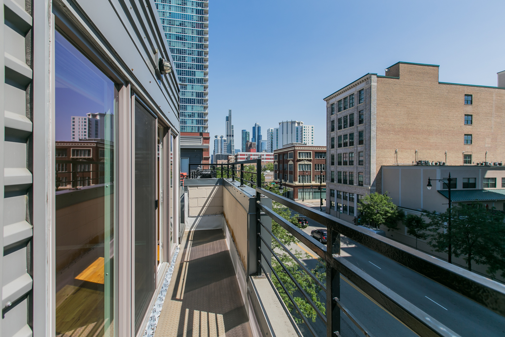 1808 South Michigan Avenue, Unit 38 Chicago, IL 60616 - Photo 17 of 18 a city view from a balcony