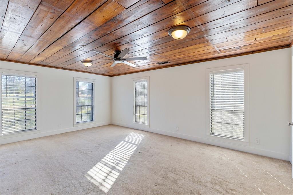 209 McMillen Road Lucas, TX 75002 - Photo 15 of 38 a view of an empty room with windows