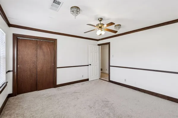 a view of empty room with windows