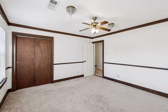 a view of empty room with windows