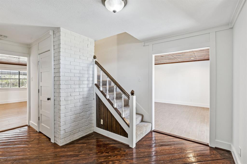 209 McMillen Road Lucas, TX 75002 - Photo 4 of 38 a view of an entryway with wooden floor