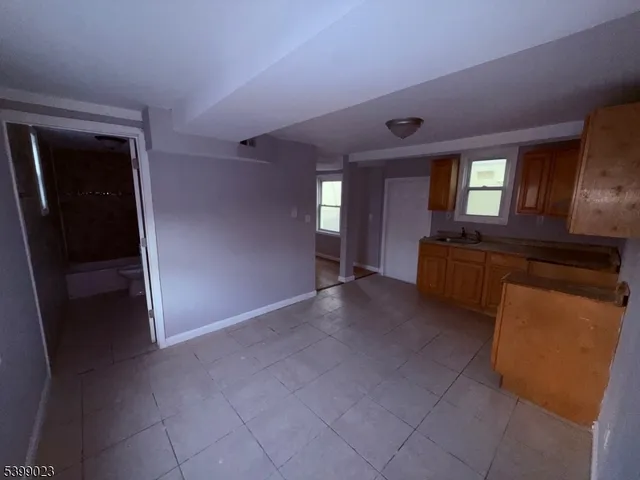 a view of a livingroom with a furniture