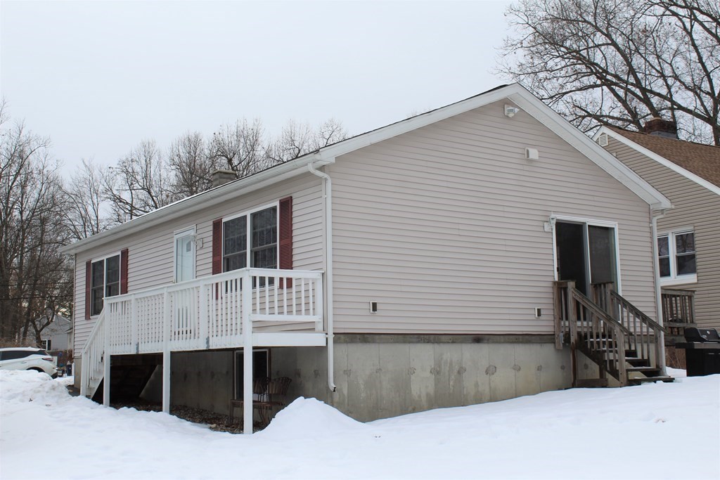 78 Point Grove Road Southwick, MA 01077 - Photo 1 of 33 a front view of a house with a yard