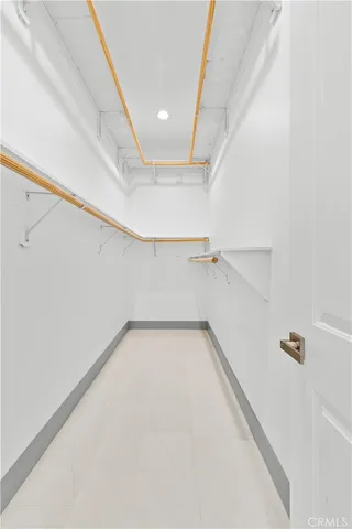 a view of a room with racks on the wall