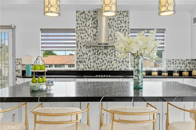 a room with table and chairs