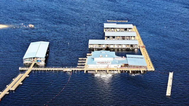 a view of workspace with wooden floor