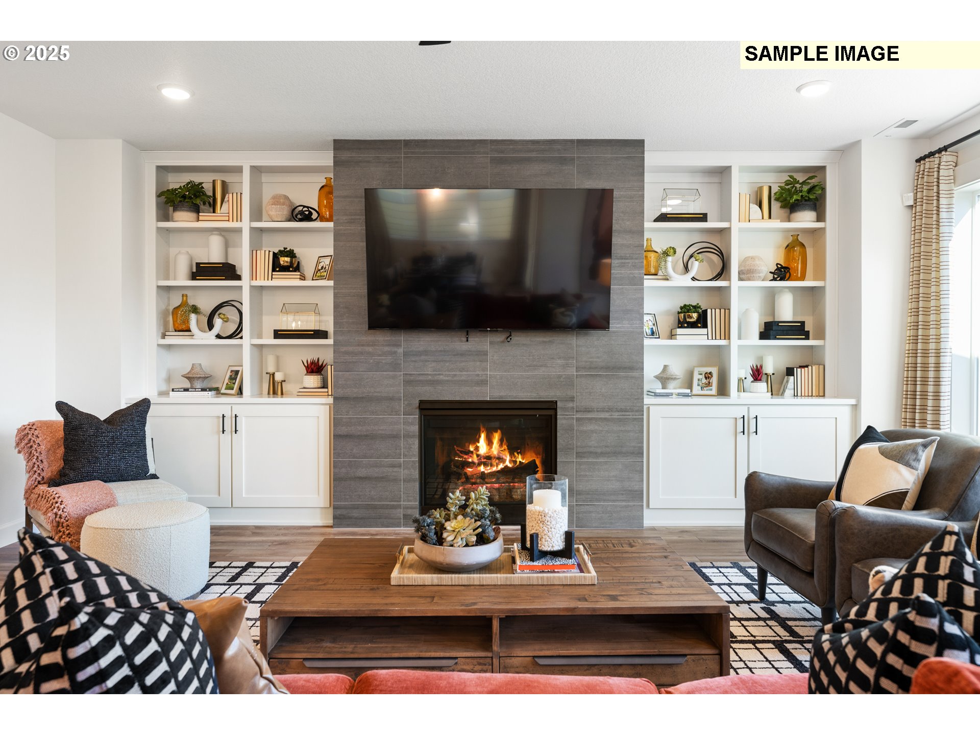 16502 Southwest Deer Terrace Durham, OR 97224 - Photo 18 of 42 a living room with furniture fireplace and flat screen tv