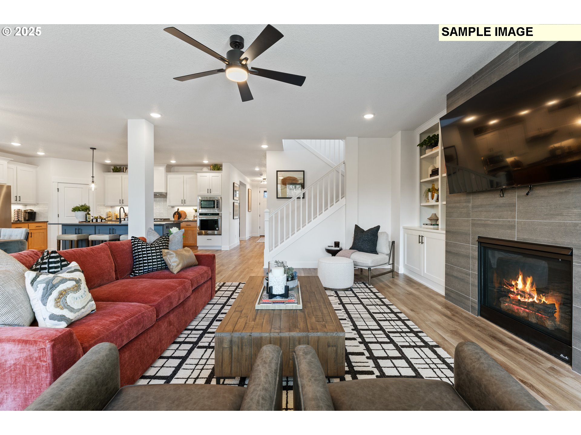 16502 Southwest Deer Terrace Durham, OR 97224 - Photo 22 of 42 a living room with furniture and a fireplace