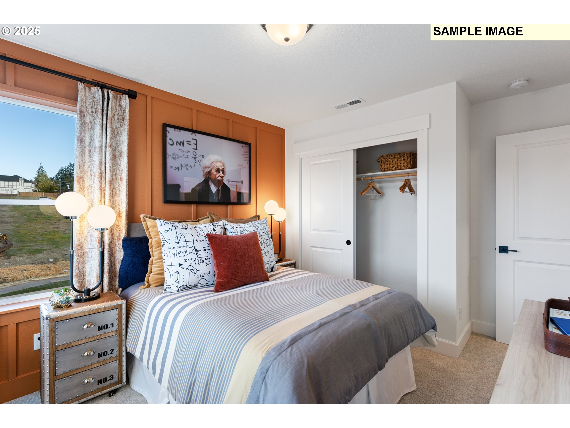 16502 Southwest Deer Terrace Durham, OR 97224 - Photo 29 of 42 a bedroom with a bed and a mirror