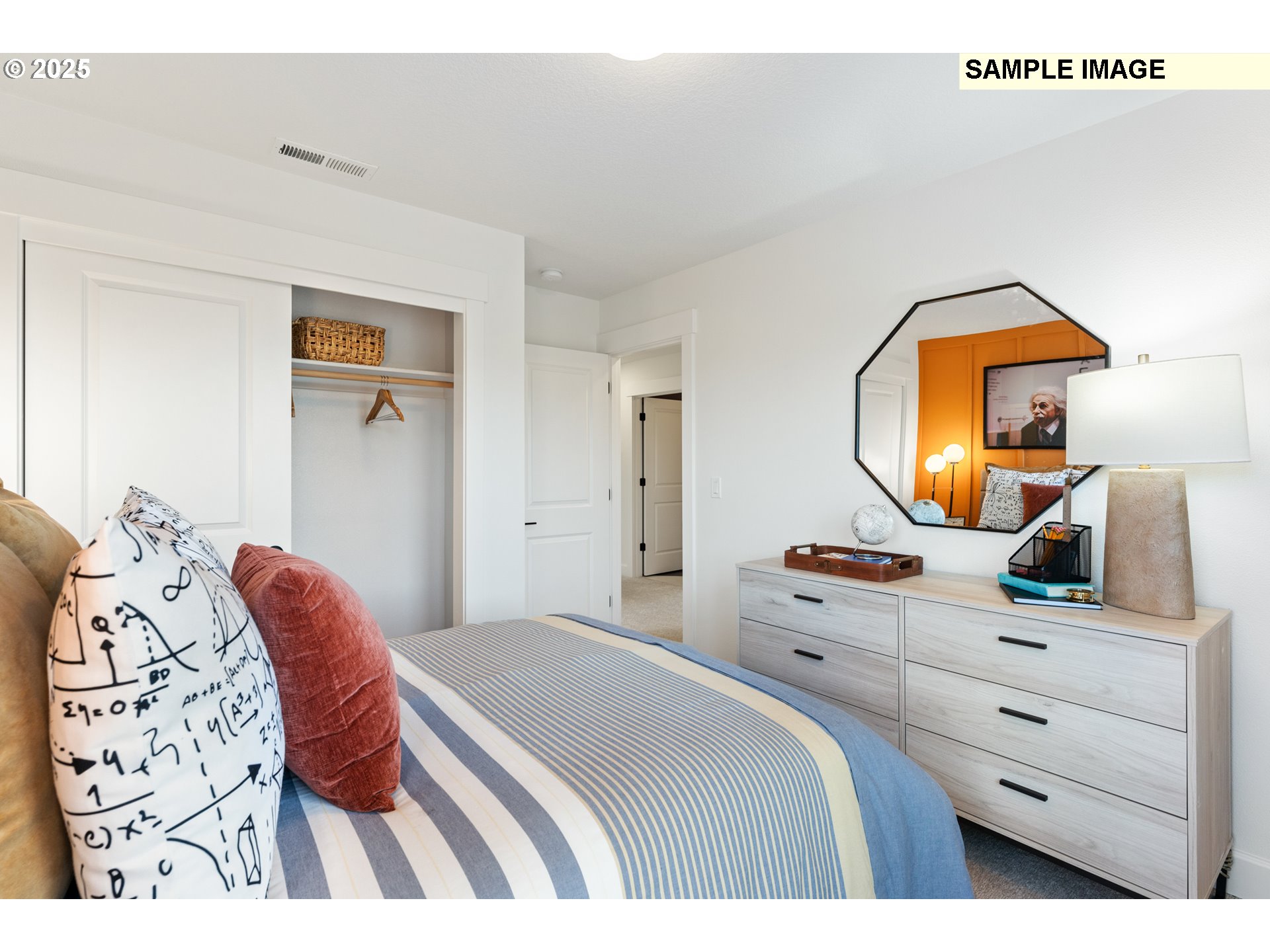 16502 Southwest Deer Terrace Durham, OR 97224 - Photo 30 of 42 a bedroom with a bed and a dresser