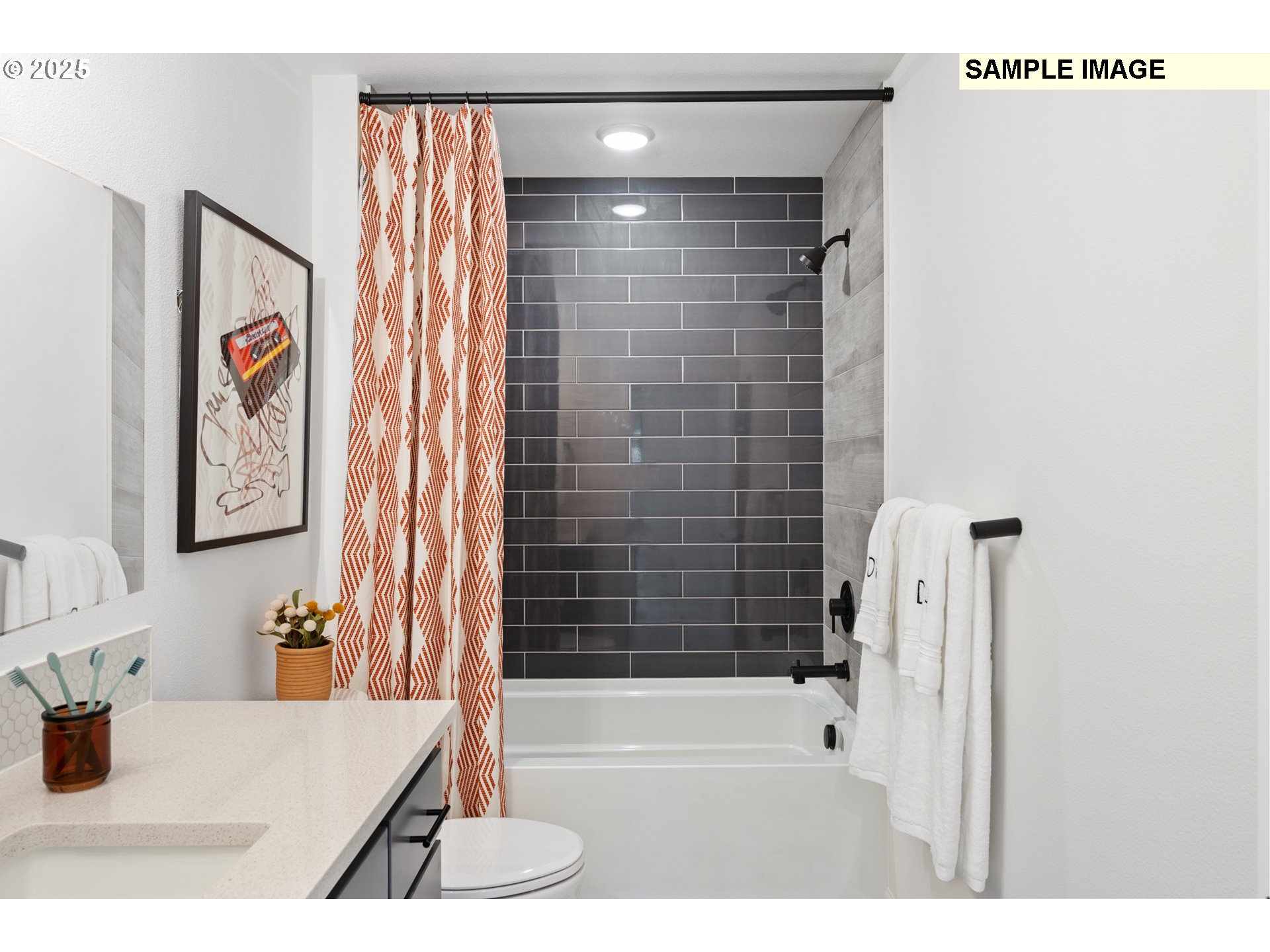 16502 Southwest Deer Terrace Durham, OR 97224 - Photo 32 of 42 a bathroom with a bathtub and a shower