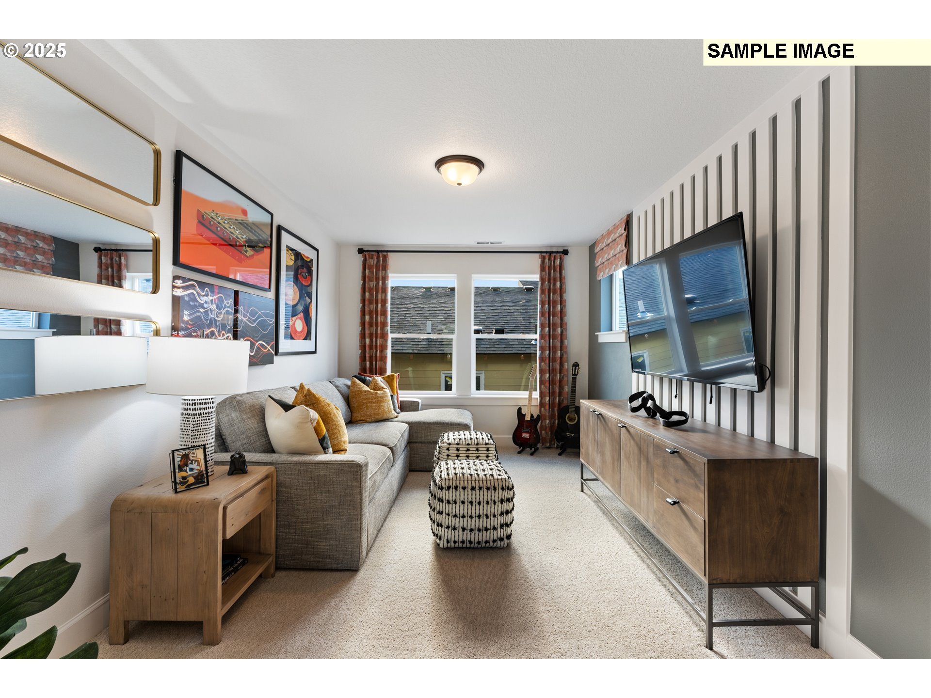 16502 Southwest Deer Terrace Durham, OR 97224 - Photo 33 of 42 a living room with furniture a flat screen tv and a floor to ceiling window