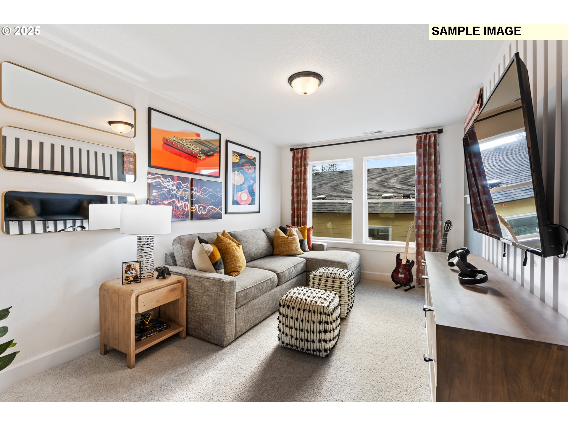16502 Southwest Deer Terrace Durham, OR 97224 - Photo 34 of 42 a living room with furniture and a flat screen tv
