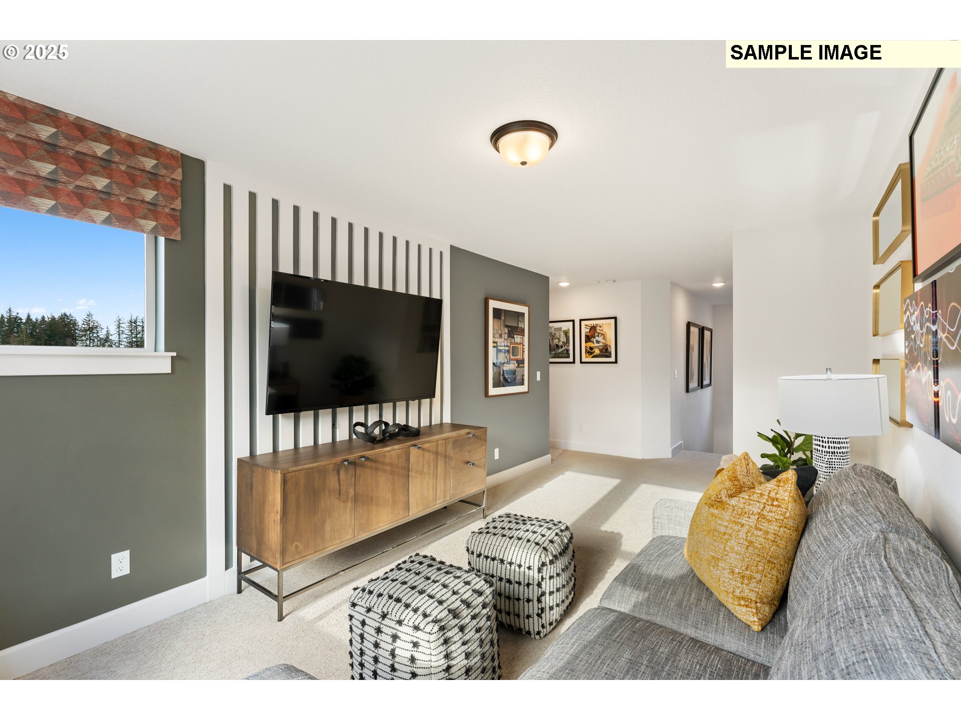16502 Southwest Deer Terrace Durham, OR 97224 - Photo 35 of 42 a living room with furniture and a flat screen tv