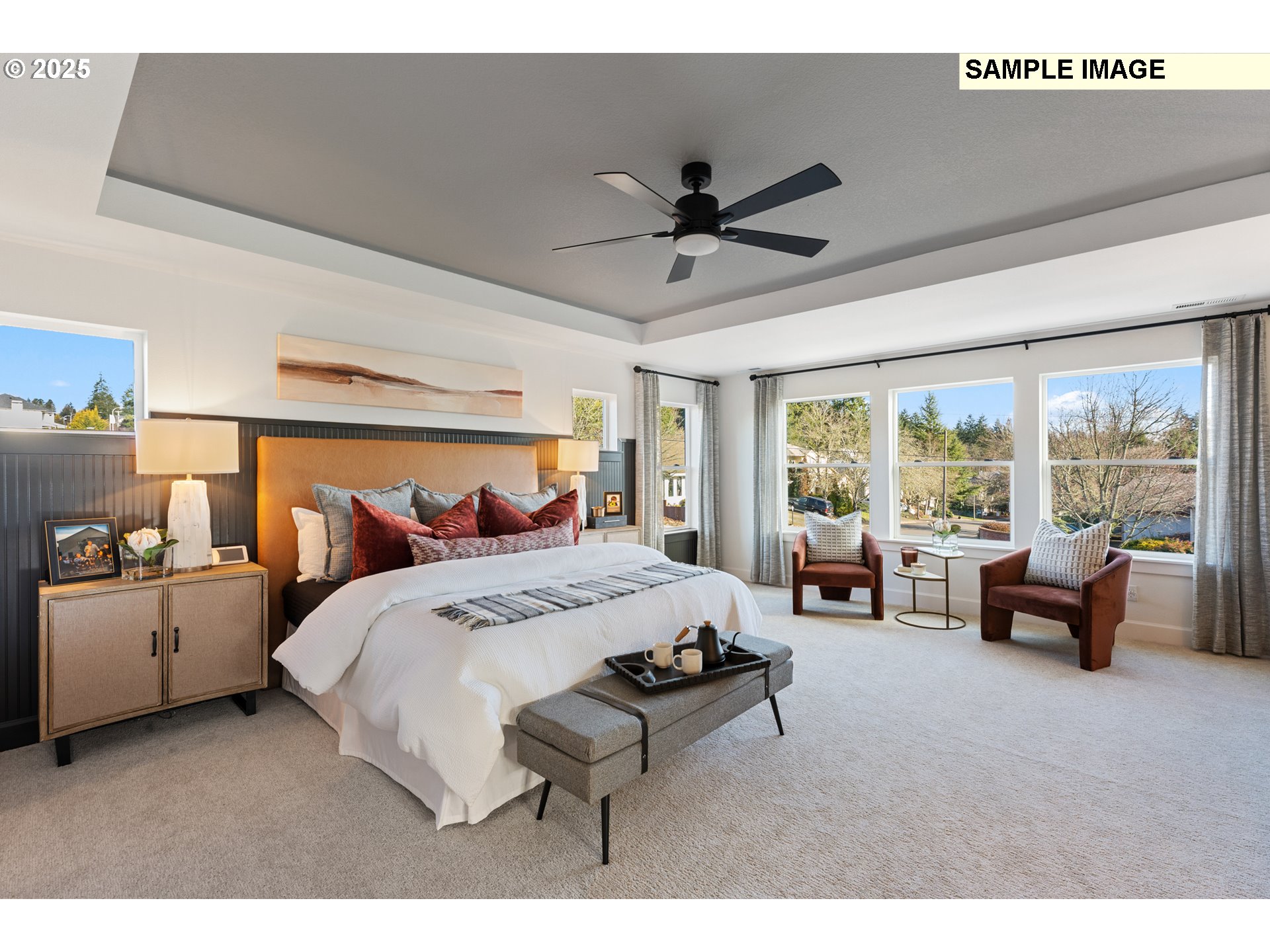 16502 Southwest Deer Terrace Durham, OR 97224 - Photo 37 of 42 a spacious bedroom with a bed and a couch