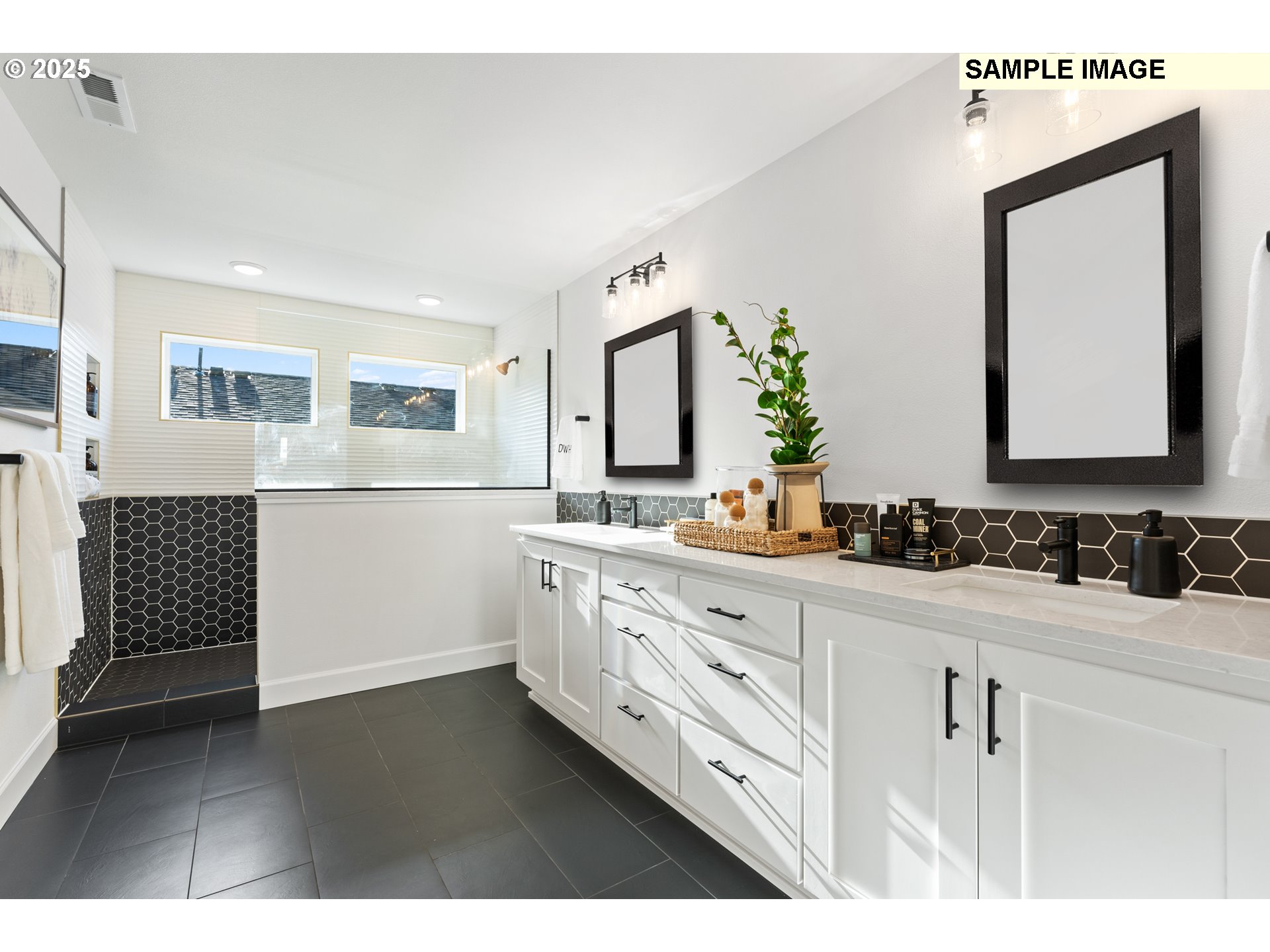 16502 Southwest Deer Terrace Durham, OR 97224 - Photo 40 of 42 a bathroom with a double vanity sink and mirror