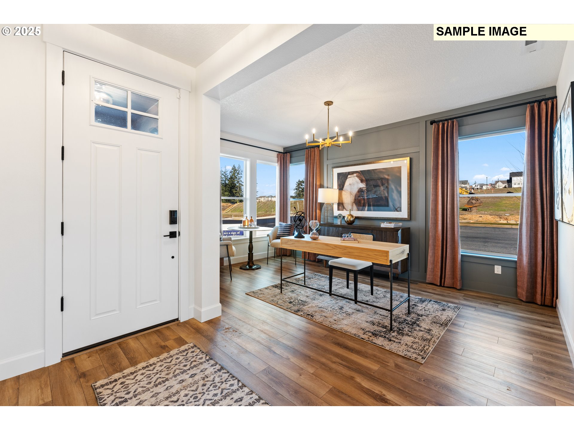 16502 Southwest Deer Terrace Durham, OR 97224 - Photo 5 of 42 a living room with furniture a table and wooden floor