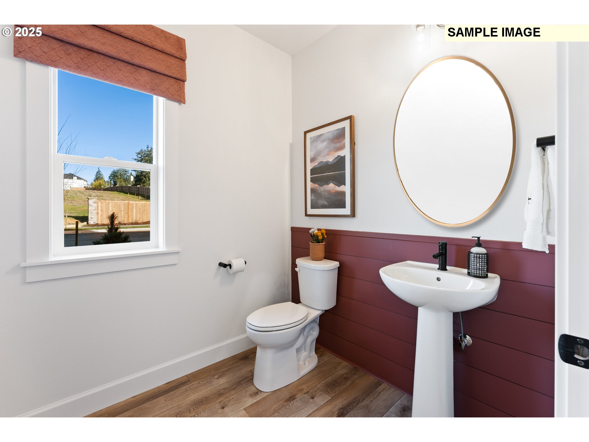 16502 Southwest Deer Terrace Durham, OR 97224 - Photo 6 of 42 a bathroom with a sink and a mirror