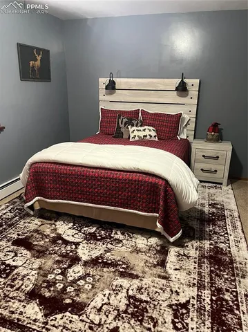a bathroom with a sink and mirror with toilet