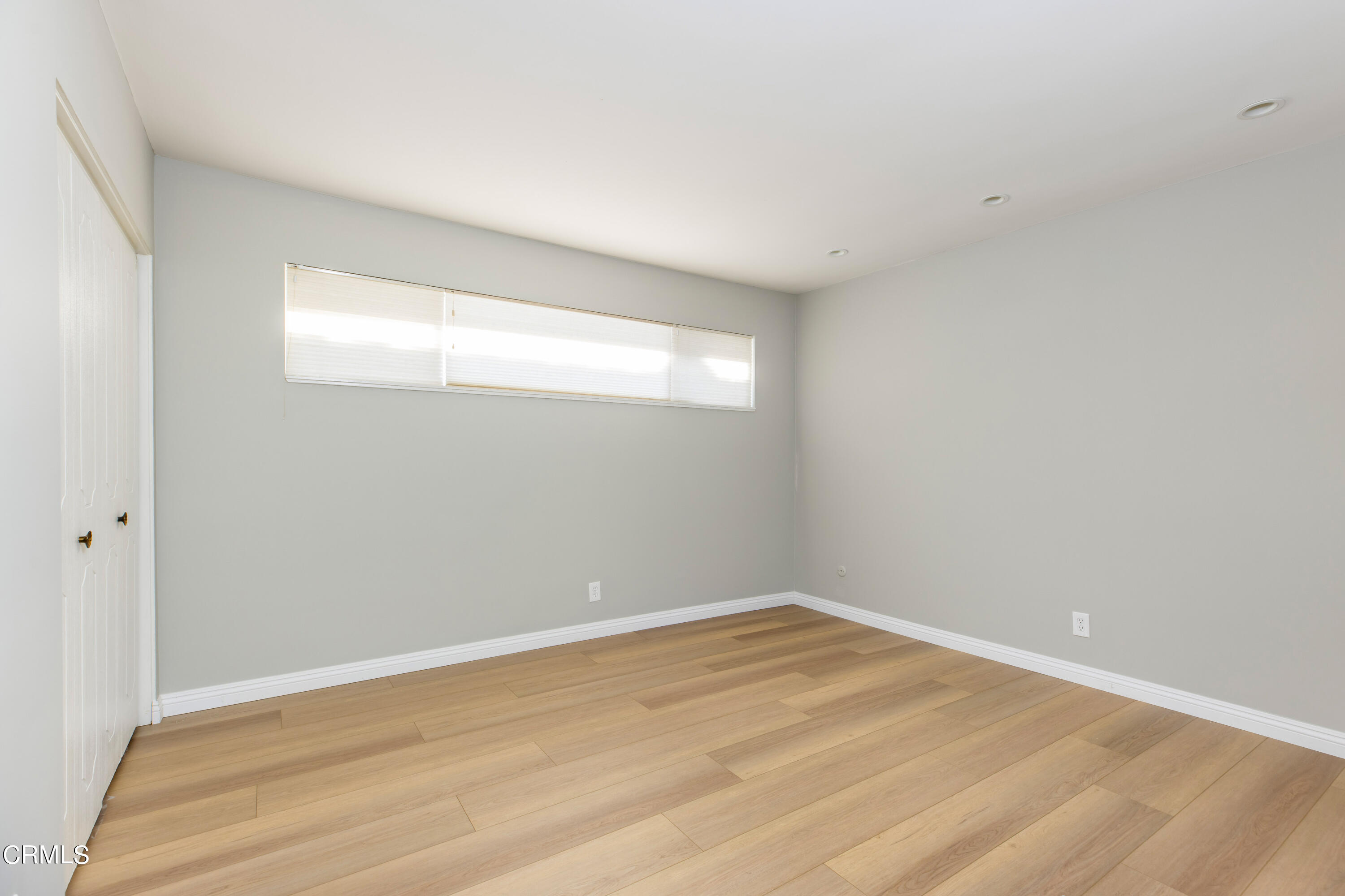 911 Arden Road Pasadena, CA 91106 - Photo 15 of 19 a view of an empty room with wooden floor