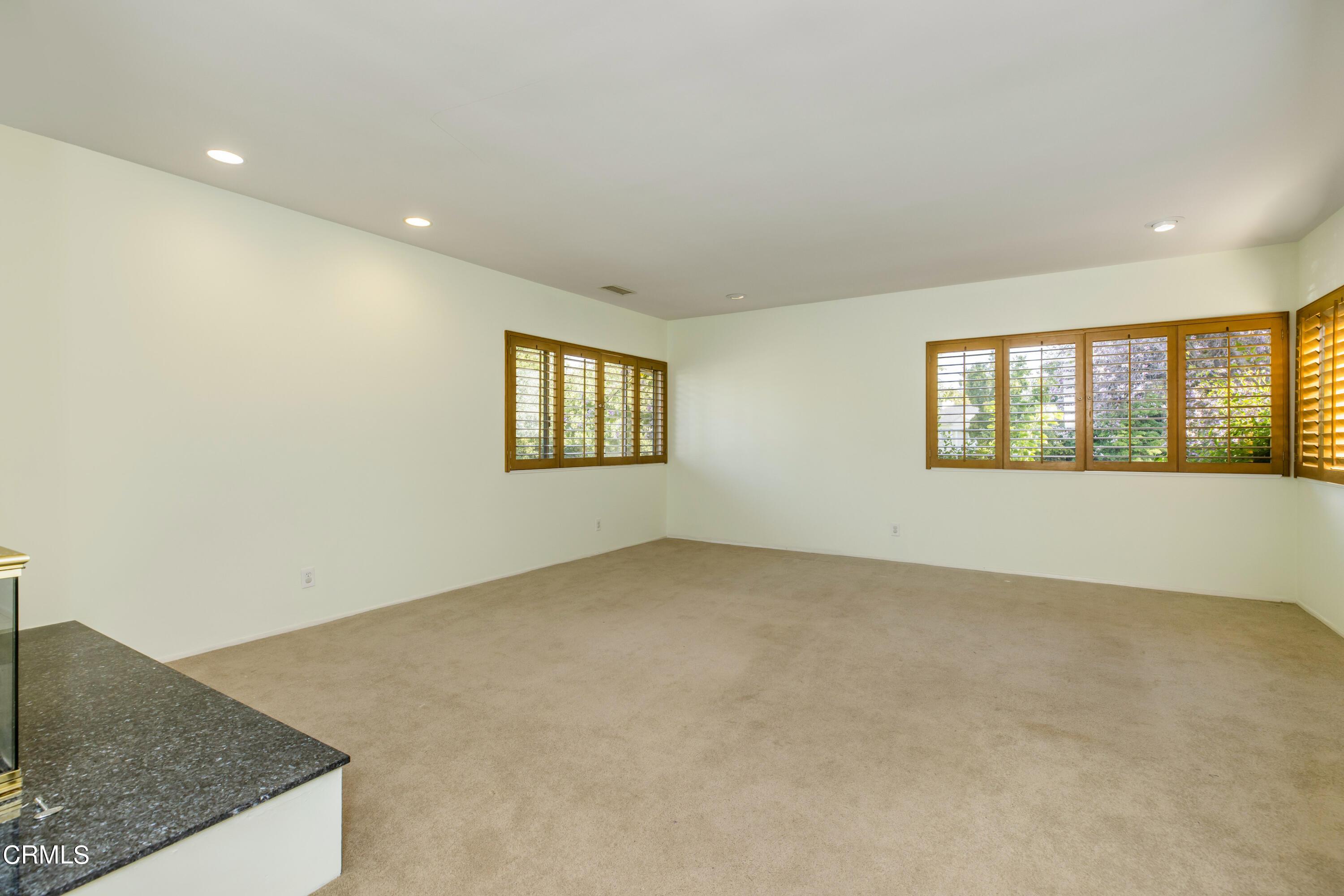 911 Arden Road Pasadena, CA 91106 - Photo 5 of 19 a view of an empty room with a window