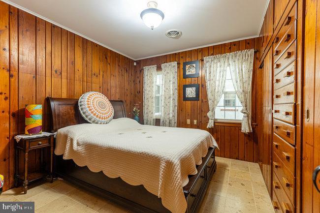 10246 Golf Course Road Fayetteville, PA 17222 - Photo 18 of 62 a bedroom with a bed and a window